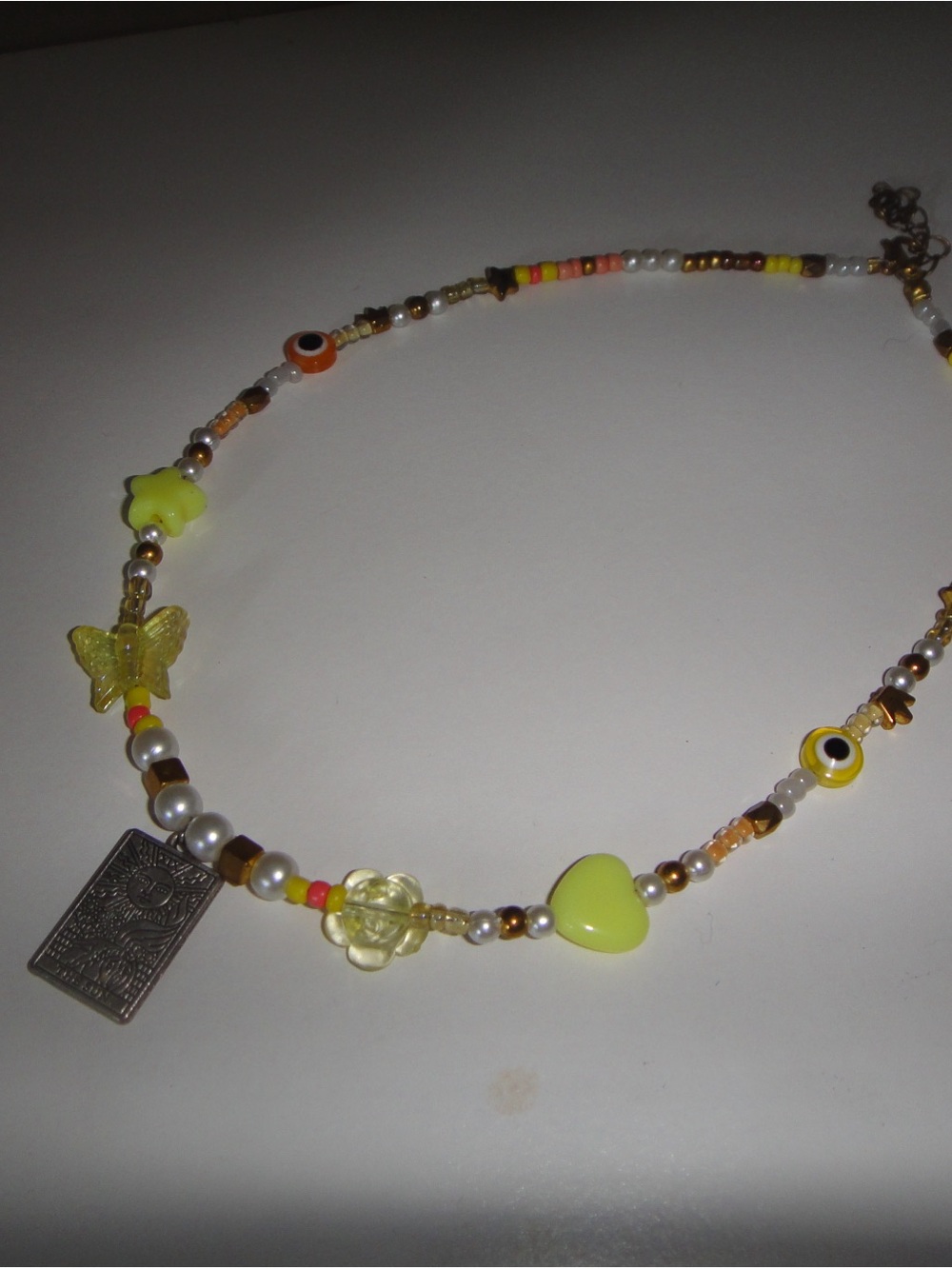 Yellow Beaded Charm Necklace with Heart & Butterfly Accents